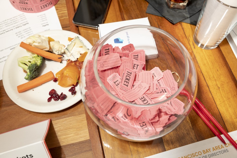 A picture of a bowl of raffle tickets at the SMPS SFBAC 2019 Holiday Party